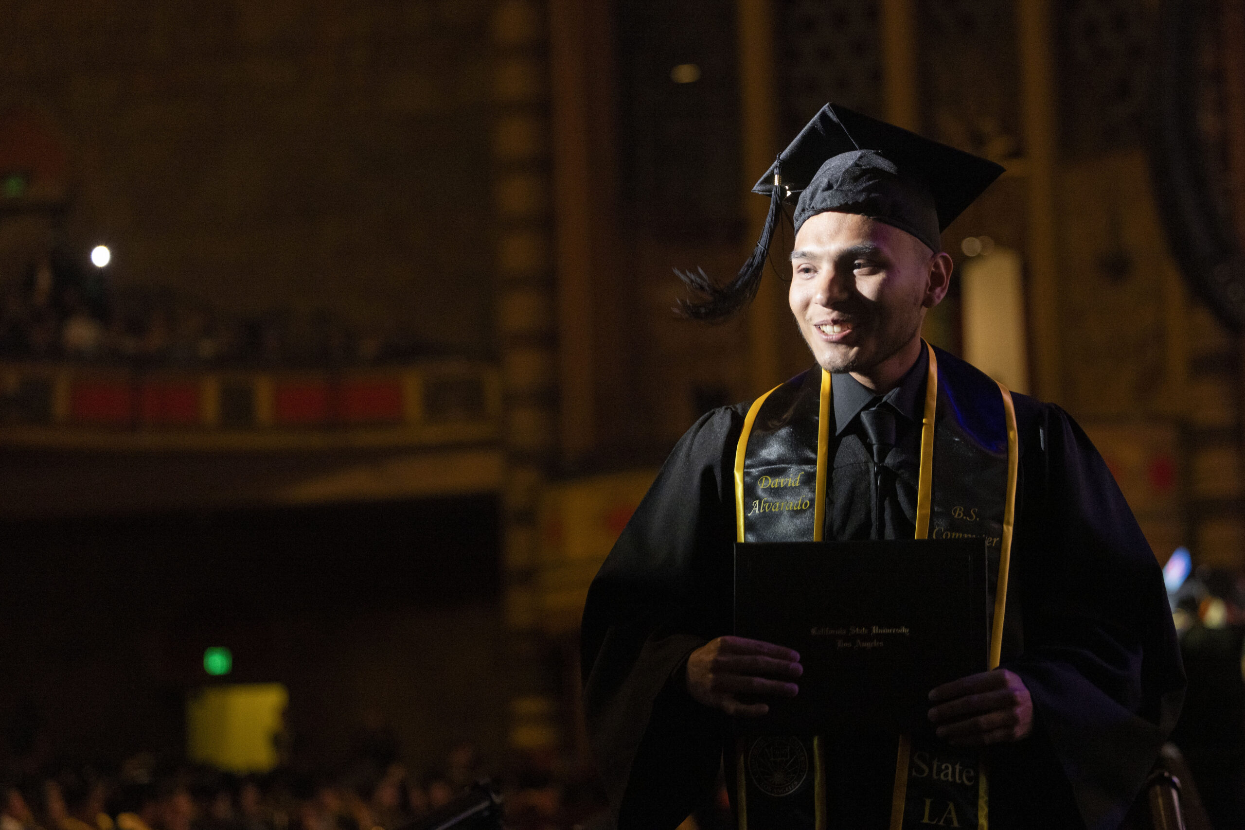 Photo of young man at a college graduation ceremony